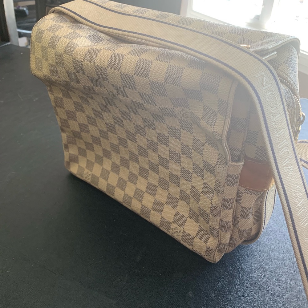 Authentic LOUIS VUITTON Naviglio Messenger bag.